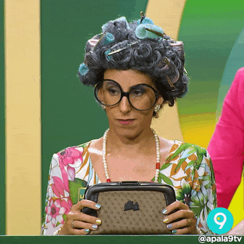 a woman with curlers in her hair is holding a purse in front of a green background with the number 9 on it