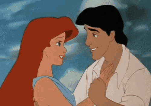 ariel and eric from the little mermaid are dancing together .