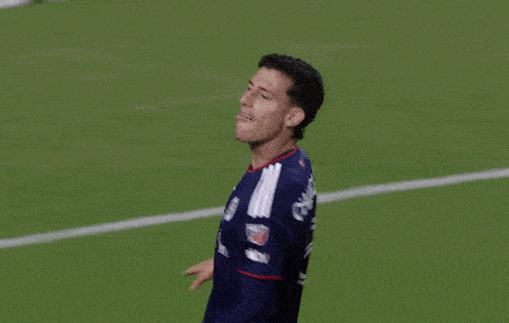 a blurry picture of a person wearing a jersey with the number 9 on it