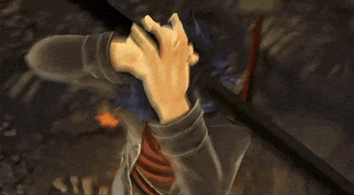 a video game character is holding a sword and covering his face