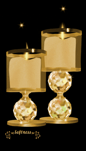 two gold candle holders with a black background and the word softness at the bottom