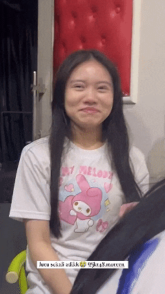 a girl wearing a white t-shirt with my melody on the front