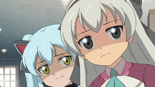 two anime girls are looking at the camera with tokyo mx on the bottom left