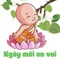 a baby buddha is sitting on a lotus flower with leaves .