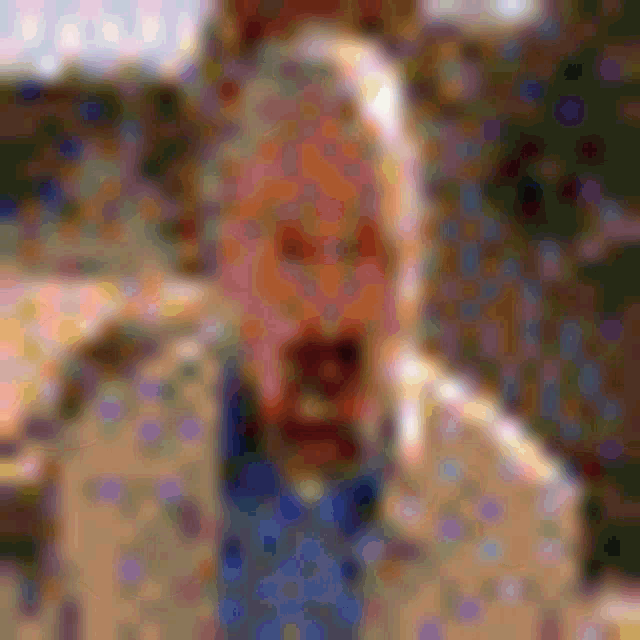 a blurry picture of a man in a suit and tie