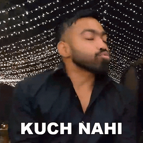 a man with a beard is wearing a black shirt and making a funny face with the words kuch nahi above him