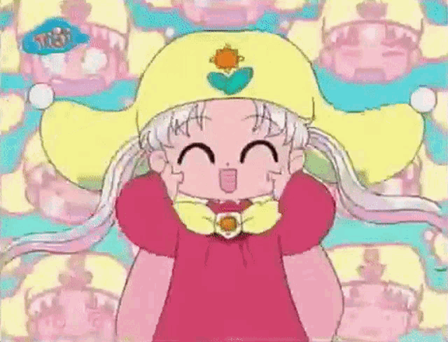 a cartoon girl wearing a pink dress and a yellow hat is smiling .