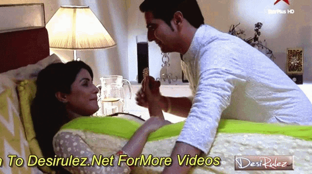 a man kissing a woman 's hand with the words desirulez.net for more videos below them