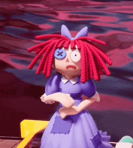 a doll with red dreadlocks and a blue button on her eye