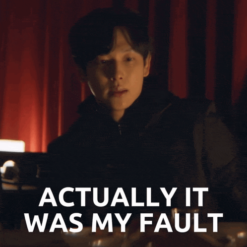a man in a dark room with the words actually it was my fault