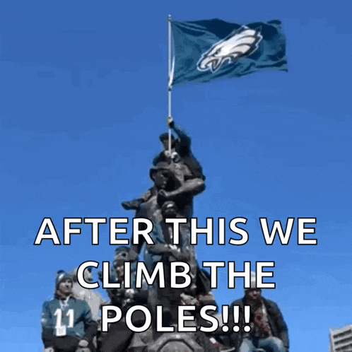 a group of people standing on top of a statue holding a flag that says after this we climb the poles !!!