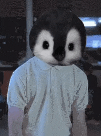 a person with a penguin mask on their face