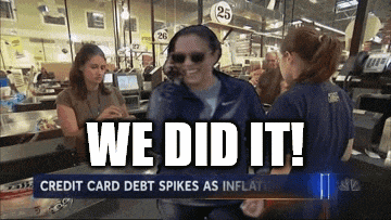 a woman in sunglasses stands in front of a sign that reads we did it