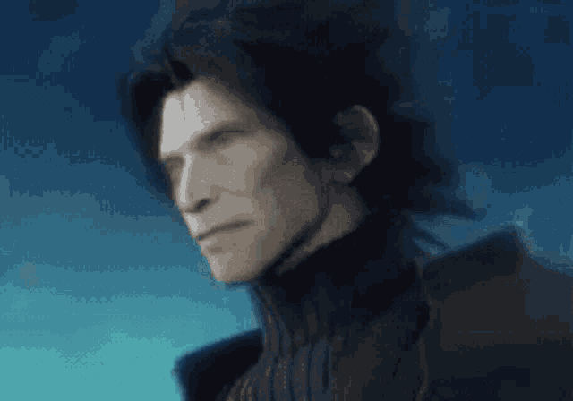 a close up of a man 's face with a turtleneck on