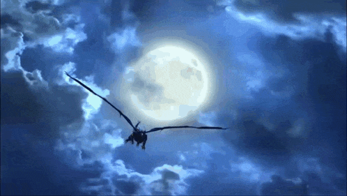 a dragon is flying through a cloudy night sky with a full moon in the background .