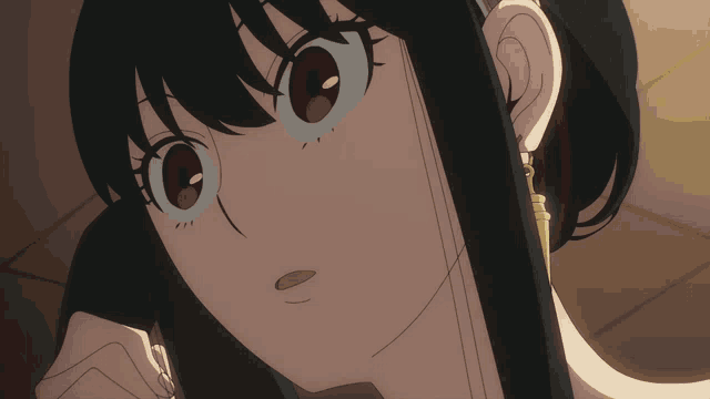 a close up of a girl 's face with red eyes and earrings