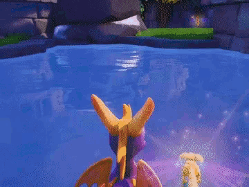 a purple and orange dragon is swimming in a pool