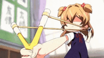 a girl is holding a slingshot with a rubber band around her mouth