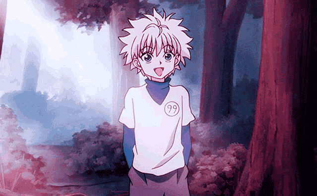 a boy with the number 99 on his shirt stands in the woods