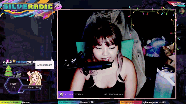 a woman sitting in front of a microphone with the words silveradic on the top