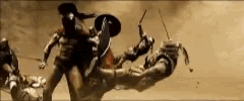a group of soldiers are fighting each other in a battle .