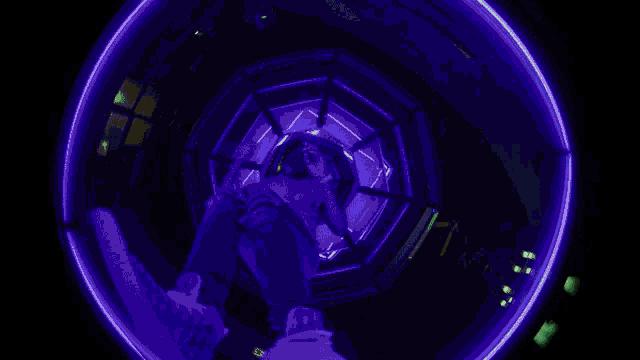 a glow in the dark dice in a glass bowl