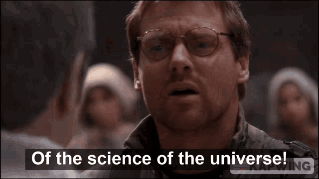 a man with glasses and the words of the science of the universe behind him