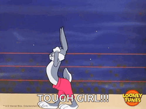 bugs bunny from looney tunes is dancing in a ring .