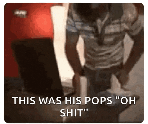 a man standing in front of a laptop with the words " this was his pops oh shit "