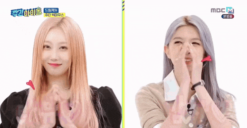 two women are making a heart shape with their hands and the words mbc on the bottom right