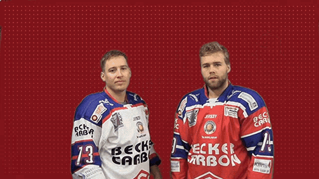 two hockey players wearing shirts that say ecker bon