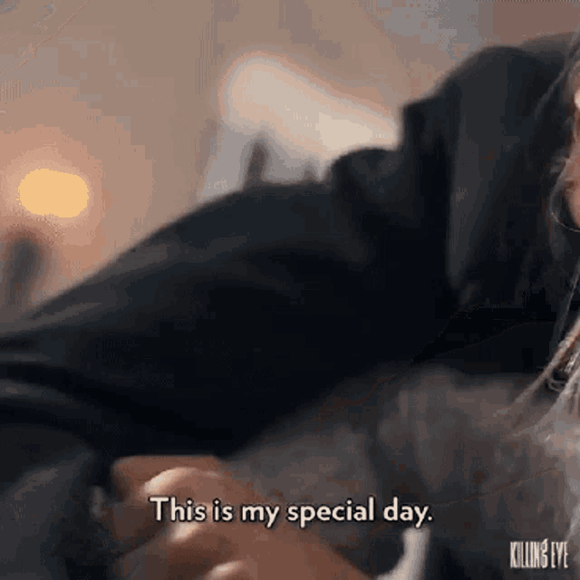 a woman is laying on a bed holding a man 's hand and says `` this is my special day . ''