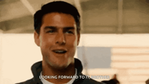 a close up of a man 's face with the words `` looking forward to it , brother '' .