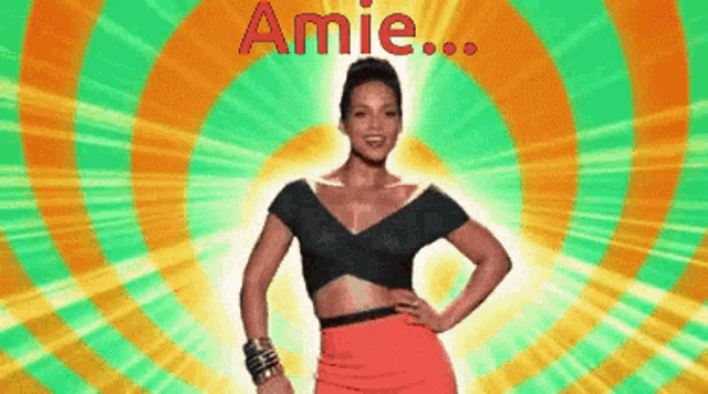 a woman is standing in front of a colorful background with the word amie written in red