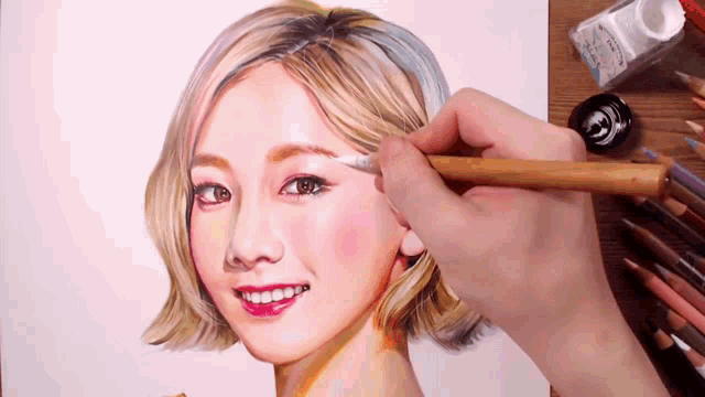 a person is drawing a woman with a pencil
