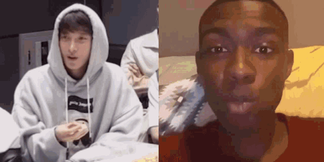 a man in a hoodie and a man in a red shirt are sitting next to each other