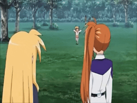 two anime girls are standing in a grassy field