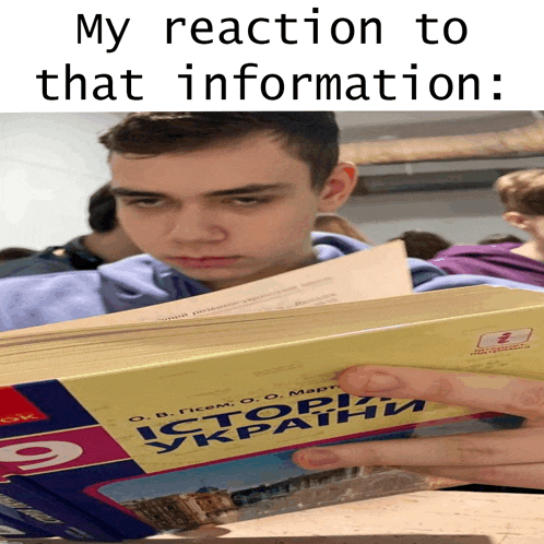 a young man is reading a book titled " istorya ukraine "
