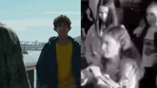 a man in a yellow shirt is standing next to a black and white photo of a woman holding a child .