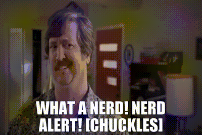 a man with a mustache says " what a nerd ! nerd alert ! chuckles ! "
