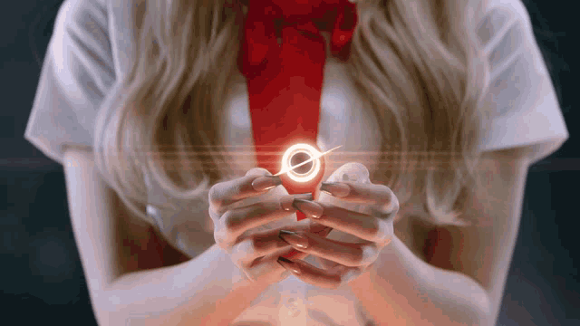 a woman in a white shirt and red tie is holding a glowing object