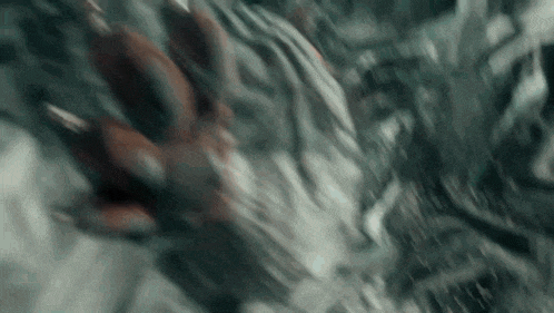 a close up of a person 's hand reaching out towards something