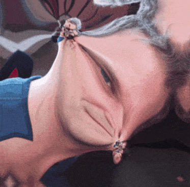 a close up of a man 's face with a strange face