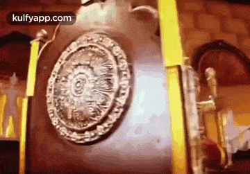 a close up of a circular emblem on a wall .