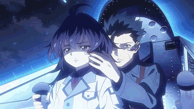 a man and a girl are standing next to each other in a blue room