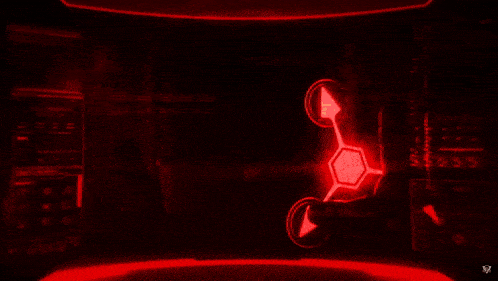 a glowing object in a dark room with the letter v in the corner