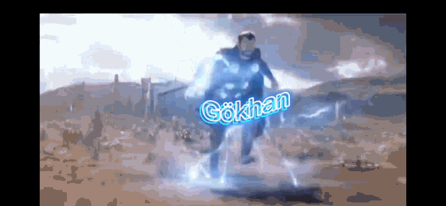 a man in a superhero costume is surrounded by lightning and the word gökhan is visible