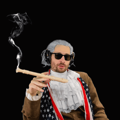 a man wearing a wig and sunglasses smoking a cigarette