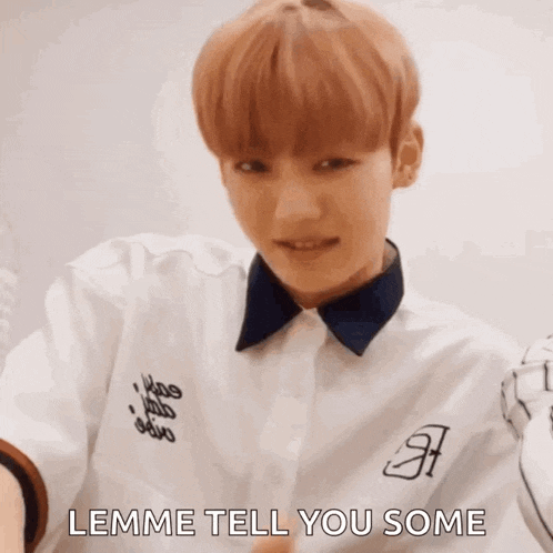 a young man wearing a white shirt with the words lemme tell you some on it