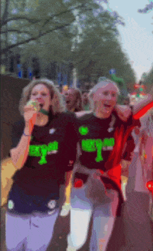 a blurry picture of two people wearing nike shirts